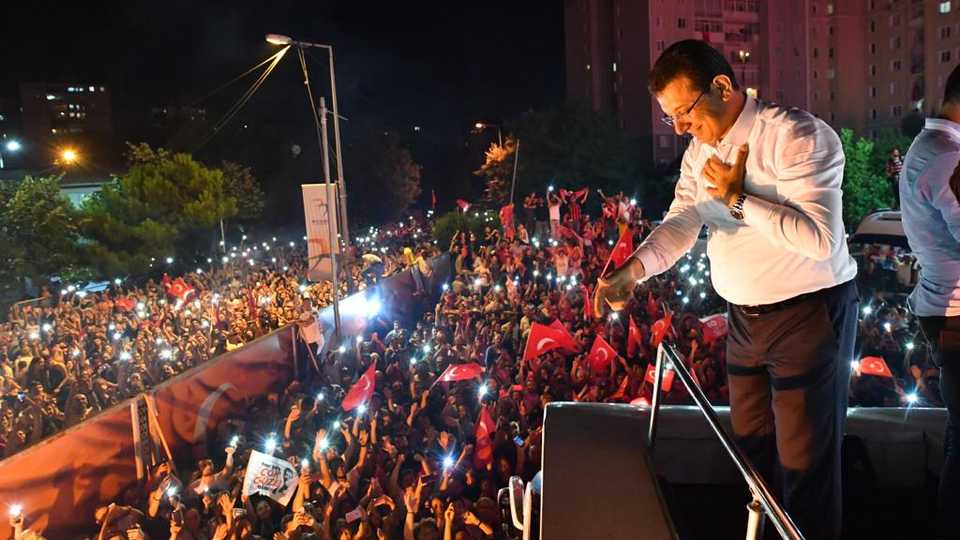 CHP candidate Ekrem Imamoglu addresses his supporters from on top of the party bus in Beylikduzu after unofficial results declared him winner in Istanbul's mayoral election rerun. June 23, 2019.