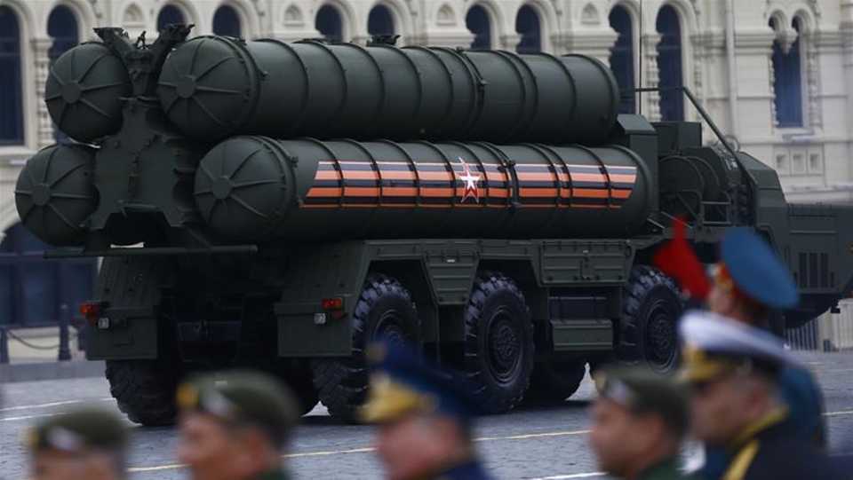 A launching vehicle of the S-400 Triumf anti-aircraft weapon system makes its way during a dress rehearsal of a 2018 military parade in Moscow.