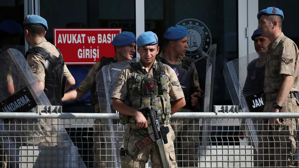A Turkish soldier stands guard outside a courtroom at the Silivri Prison and Courthouse complex in Silivri near Istanbul, Turkey, June 24, 2019.