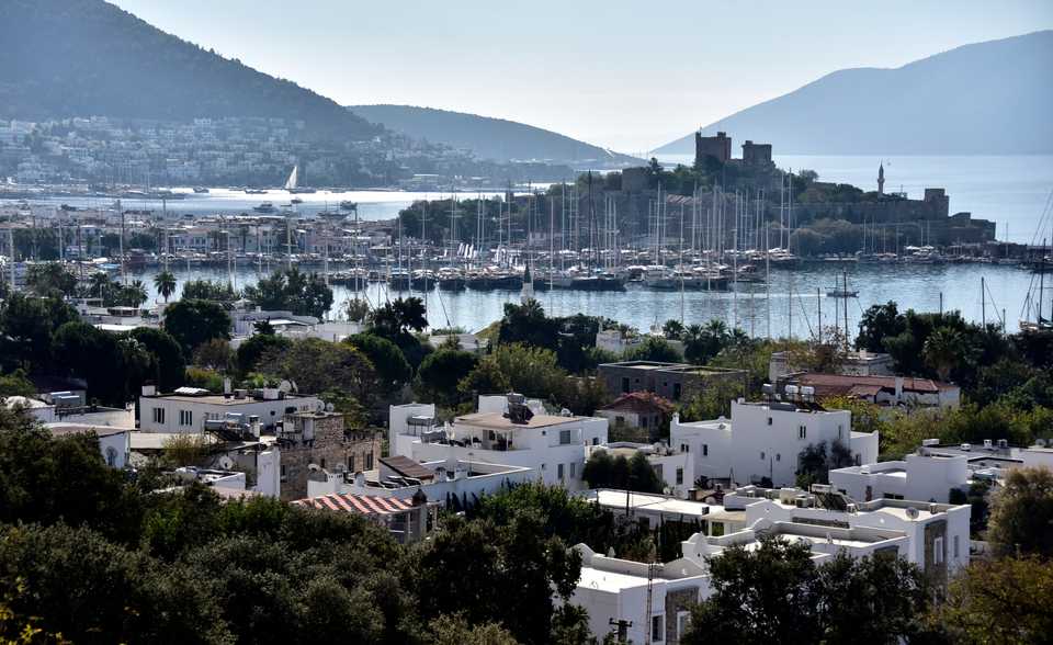 A general view of Bodrum Castle and port in Bodrum, city of Mugla, Turkey.