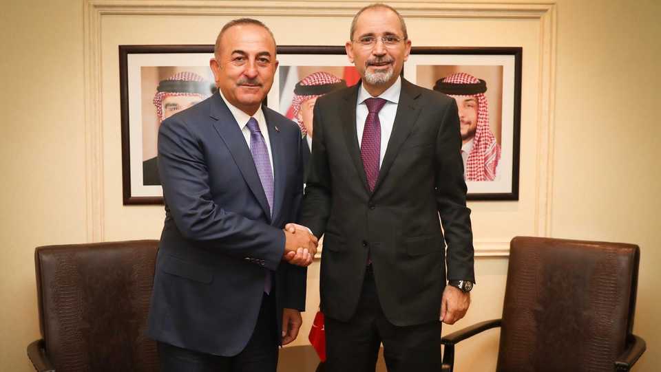 Turkish Foreign Minister Mevlut Cavusoglu (L) meets Jordan's Foreign Minister Ayman Safadi (R) in Amman, Jordan on July 23, 2019.