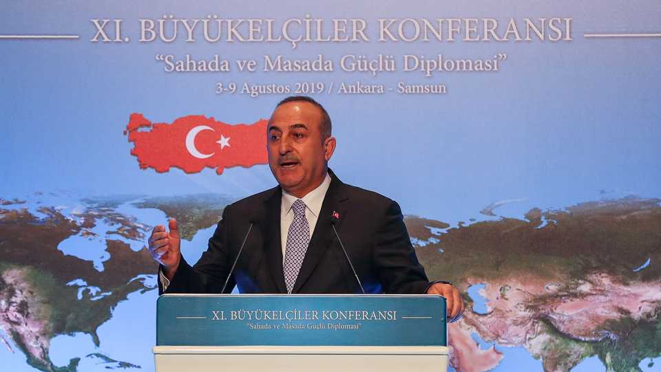 Turkish Foreign Minister Mevlut Cavusoglu delivers a speech during the 11th Ambassadors' Conference held by Turkey's Ministry of Foreign Affairs in Ankara, on August 5, 2019.