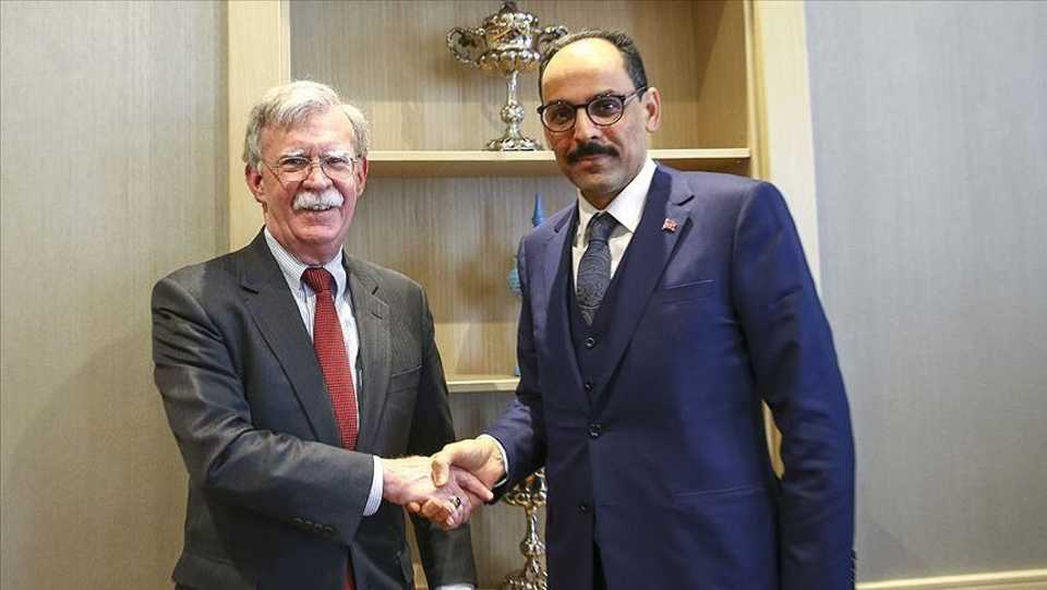 FILE PHOTO: US National Security Advisor John Bolton and Turkey's presidential aide Ibrahim Kalin shaking hands.