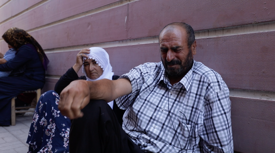 Sahap Cetinkaya, one of the fathers joining the sit-in protest in Diyarbakir, cries while expressing the loss of his 17 years old son. He was recruited by the PKK two weeks ago. His wife Fevziye sits next to him.