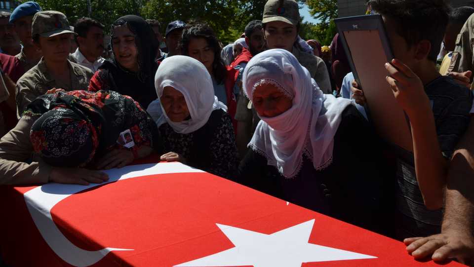 Relatives of people killed in Thursday night's attack in Diyarbakir attend their funeral on September 13, 2019.
