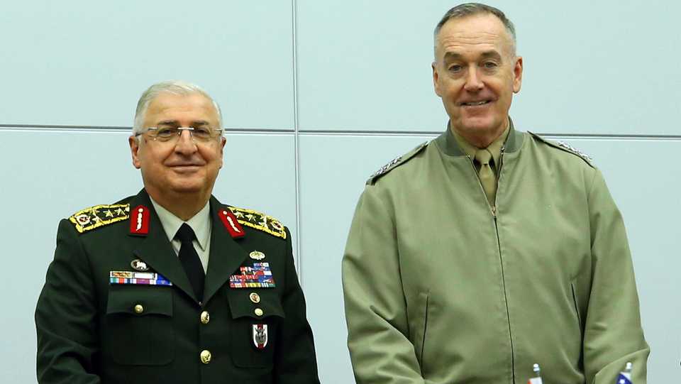 Turkish Chief of General Staff Yasar Guler (L) and US Joint Chiefs of Staff Chairman General Joseph Dunford (R) pose for a photo within the 'NATO Military Committee in Chiefs of Defence Session' on January 16, 2019 in Brussels, Belgium.