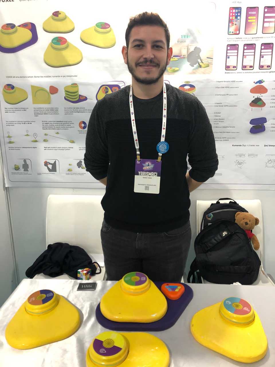 Deniz Yanik, 23, of Middle East Technical University (ODTU) with his Voxee prototypes that aim to bring a playful treatment to kids suffering from Auditory Processing Disorder.