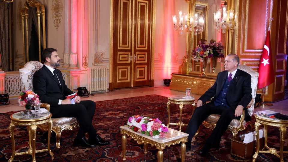 Turkish President Recep Tayyip Erdogan (R) attends an exclusive interview with TRT television in Istanbul, Turkey on April 14.