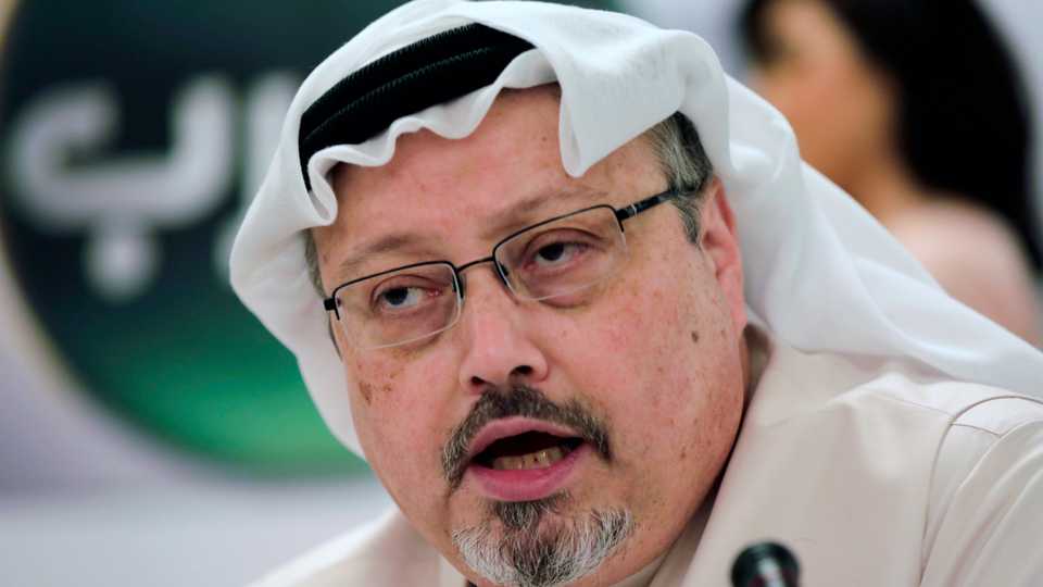 In this December 15, 2014 file photo, Saudi journalist Jamal Khashoggi speaks during a press conference in Manama, Bahrain.