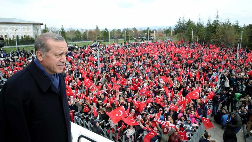 Turkish President Recep Tayyip Erdogan addresses his supporters upon his arrival at Esenboga Airport in Ankara, Turkey, April 17, 2017. 
