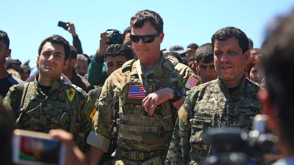 A US military general with YPG/PKK militants in northeastern Syrian town of Derik on April 25, 2017.