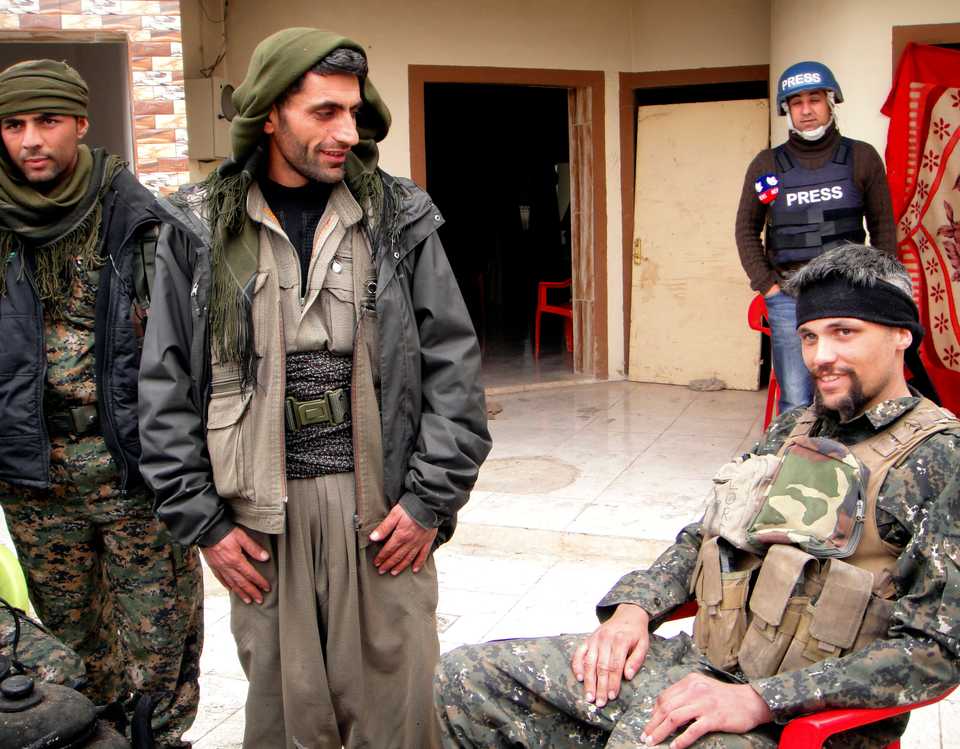 In this file photo, Jordan Matson, 28, right, a former US Army soldier can be seen with other terrorists from the YPG.