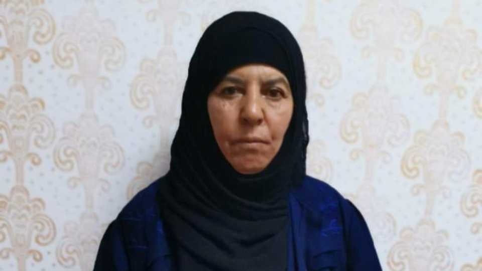 Rasmiya Awad, believed to be the sister of slain Daesh leader Abu Bakr al Baghdadi, who was captured on Monday in the northern Syrian town of Azaz by Turkish security officials, is seen in an unknown location in an undated picture provided by Turkish security officials.