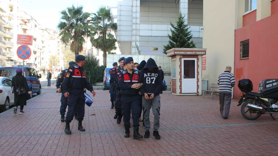 Four suspected Syrian nationals, who were detained in Turkey's Kocaeli on the grounds that they had connections to Daesh, are seen in this picture on their way to the courthouse. November 8, 2019.