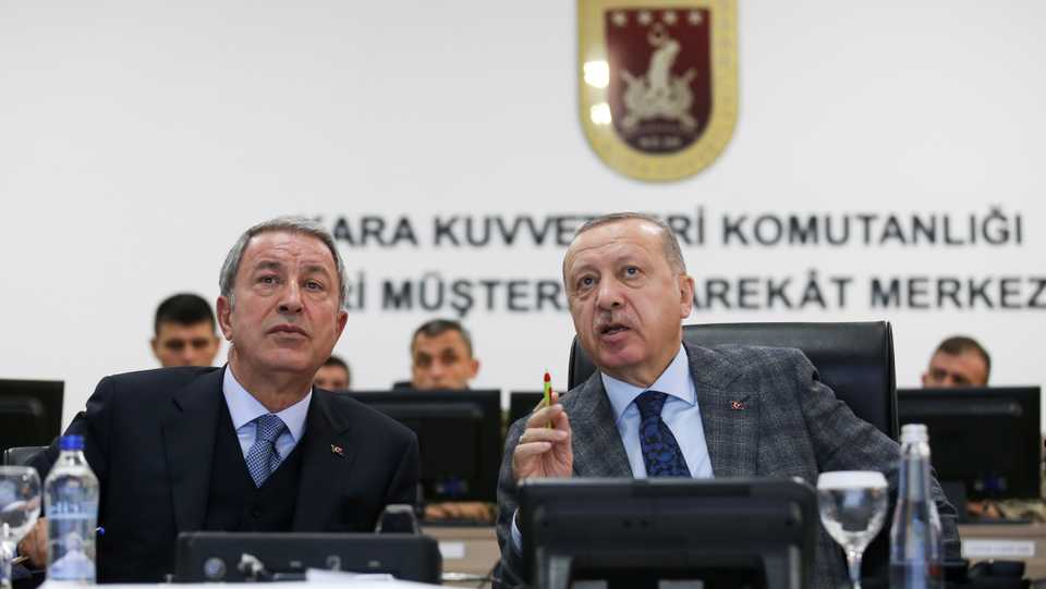 Turkish President Tayyip Erdogan and Defence Minister Hulusi Akar attend a briefing at the Land Forces' Forward Joint Operation Command Center in Sanliurfa, Turkey, November 3, 2019.