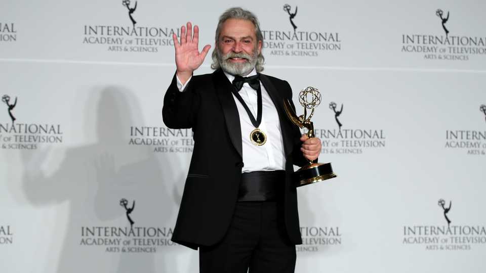 Turkish Actor Haluk Bilginer poses for a photo after he won the Best Performance by an Actor award on Monday at the 47th International Emmy Awards in New York for his performance in the TV series Sahsiyet (Persona) in New York, United States on November 25, 2019.