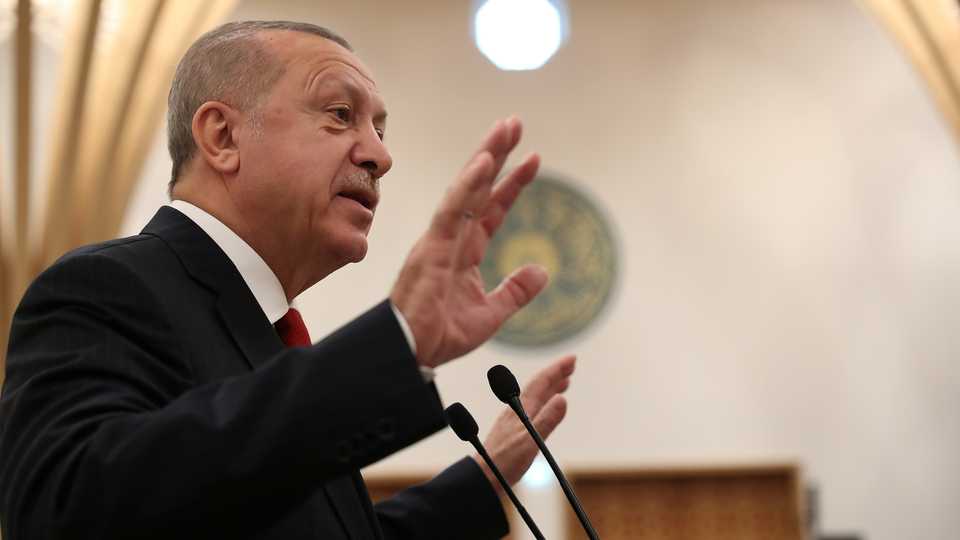 President of Turkey, Recep Tayyip Erdogan, addresses the audience during the official opening of the new Cambridge Central Mosque, in Cambridge, Britain, December 5, 2019.