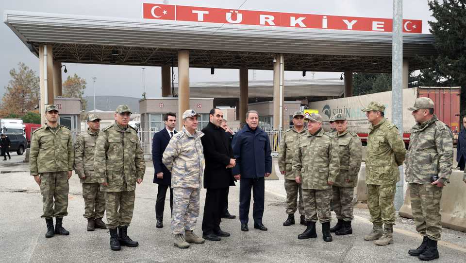 National Defence Minister Hulusi Akar with Chief of General Staff Gen. Yasar Guler, Land Forces Commander Gen. Umit Dundar, Air Forces Commander Gen. Hasan Kucukakyuz and Navy Commander Adm. Adnan Ozbal conduct inspections at Turkey's border with Syria in Hatay on December 29, 2019.