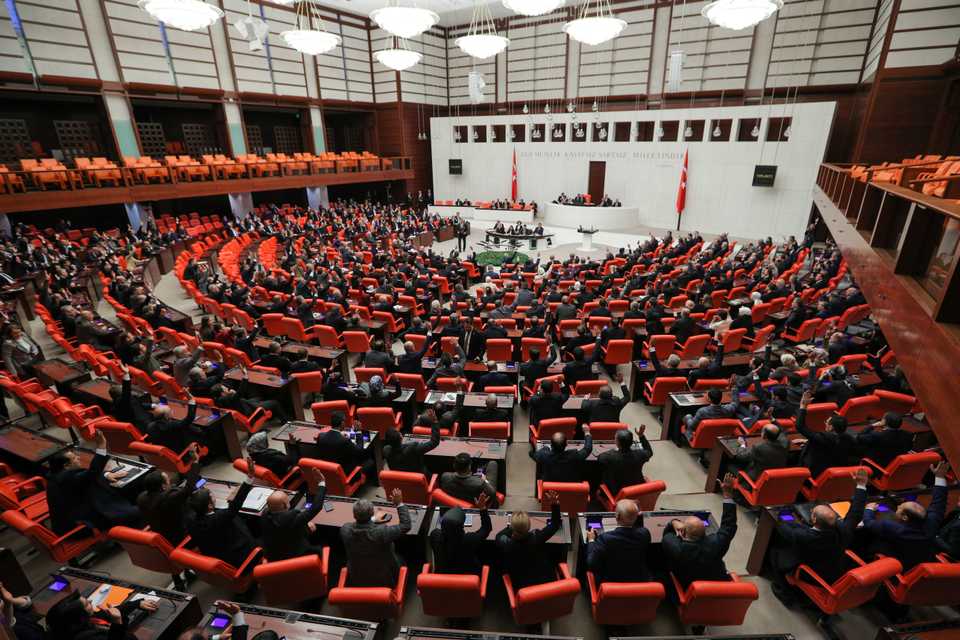 Turkish lawmakers vote a bill that allows troop deployment to Libya, at the Parliament in Ankara, Turkey, January 2, 2020.