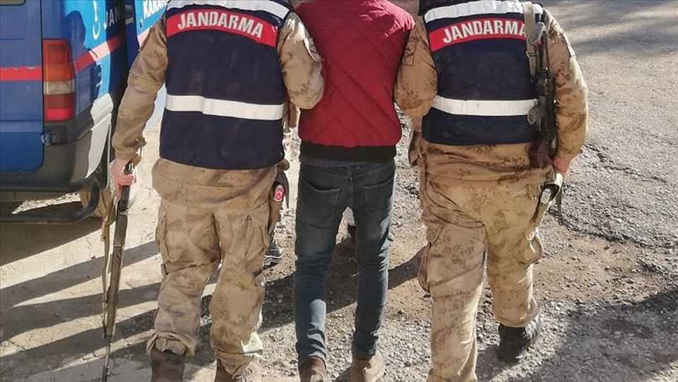 In this picture, Turkey's gendarmerie can be seen arresting a suspected PKK operative.