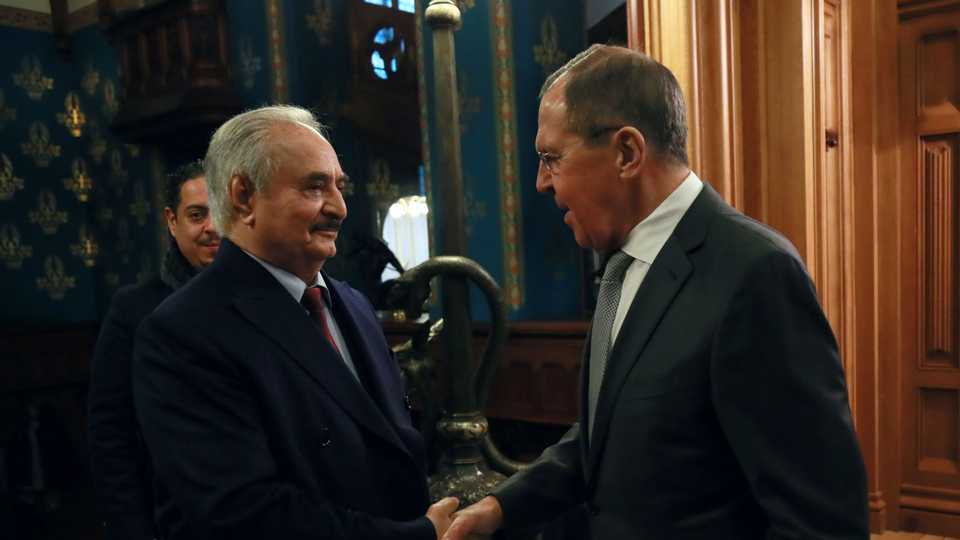 Warlord Khalifa Haftar shakes hands with Russian Foreign Minister Sergei Lavrov before talks in Moscow, Russia on January 13, 2020.