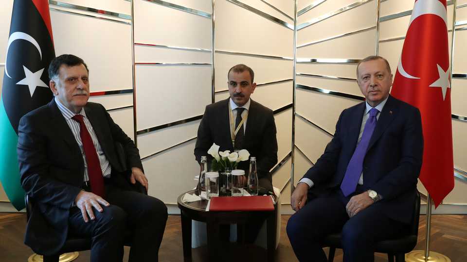 Turkish President Tayyip Erdogan meets with Libya's UN-recognised Prime Minister Fayez al Sarraj in Berlin, Germany, January 19, 2020.