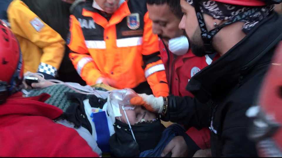 A wounded woman was rescued by the teams from the rubble in Turkey's eastern city of Elazig on January 25, 2020.