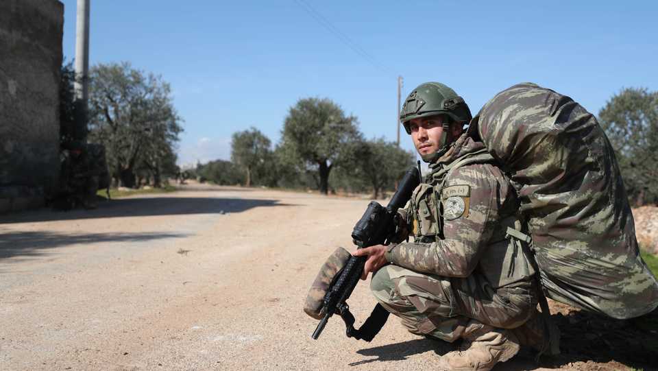 A Turkish soldier is pictured at a position near the village of Nairab, about 14 kilometres southeast of the city of Idlib, in northwestern Syria, on February 20, 2020.