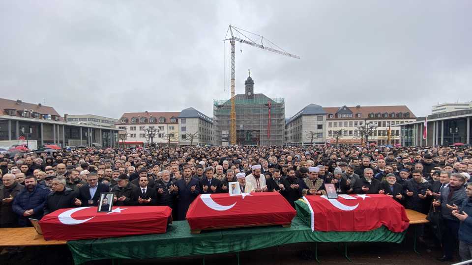 People attend the funeral ceremony held at Marktplatz for Gokhan Gultekin, Sedat Gurbuz and Fatih Saracoglu who died in the racist attack of the far-right extremist in a shooting spree in western town of Hanau, Germany on February 24, 2020.