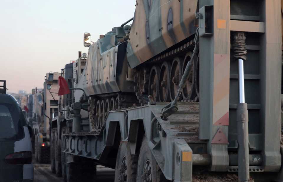 Turkish military vehicles enter the Bab al Hawa crossing at the Syrian-Turkish border, in Idlib governorate, Syria, February 9, 2020.