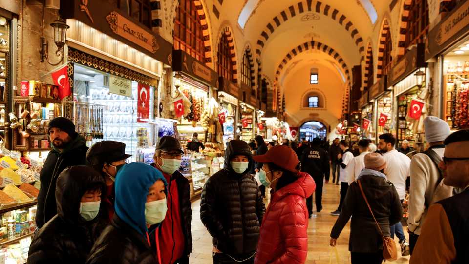 People wear protective face masks due to coronavirus concerns in Istanbul, Turkey March 16, 2020.