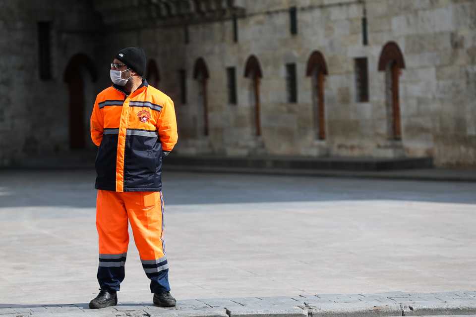 A man wearing mask is seen at Eminonu Square in the hear of Istanbul's old city.