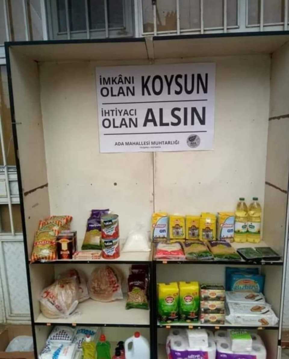 A local headman (mukhtar) from Tavsanli, a district in Turkey's Aegean province of Kutahya, set up a closet for locals to donate food in a creative way. On the top of the closet, it says 