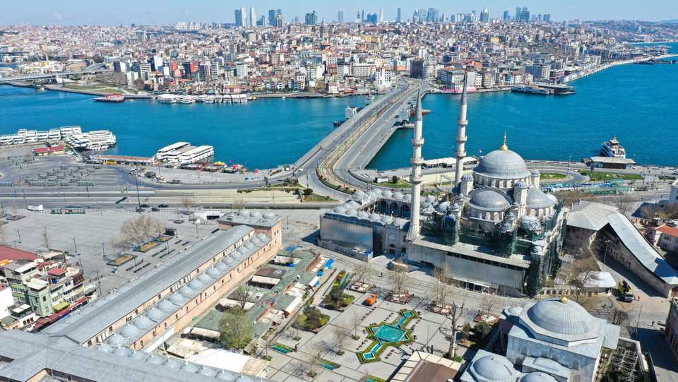 Drone photo shows deserted Galata Bridge and its surroundings after a two-day curfew imposed to stem the spread of the coranavirus (Covid-19) in Istanbul, Turkey on April 12, 2020.