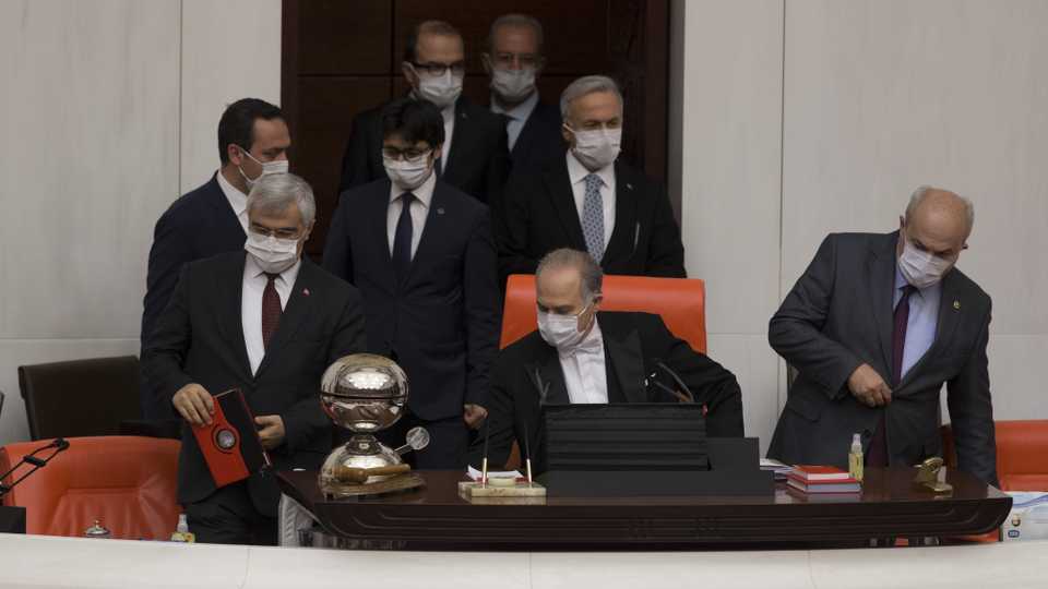 In this file photo, Turkey’s Deputy Parliament Speaker Levent Gok (Front C) wearing a protective mask as a precaution against the coronavirus (COVID-19) holds a meeting with general assembly of the Grand National Assembly of Turkey (TBMM) in Ankara, Turkey on April 07, 2020.