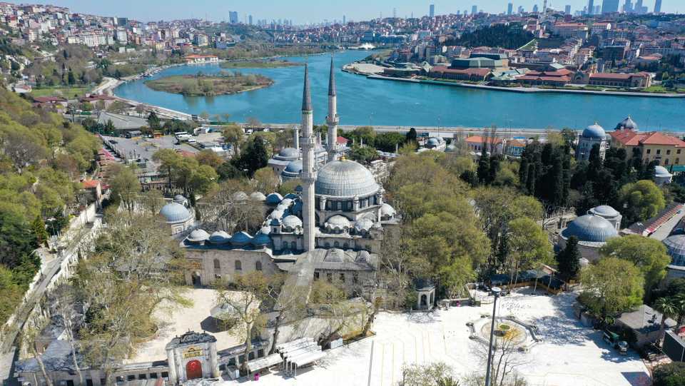 An aerial view shows Eyup Sultan Mosque and the surrounding square remain empty due to the restrictions reimposed at midnight in 31 provinces for two days as part of measures to stem the spread of the novel coronavirus (Covid-19) in Istanbul, Turkey on April 18, 2020.