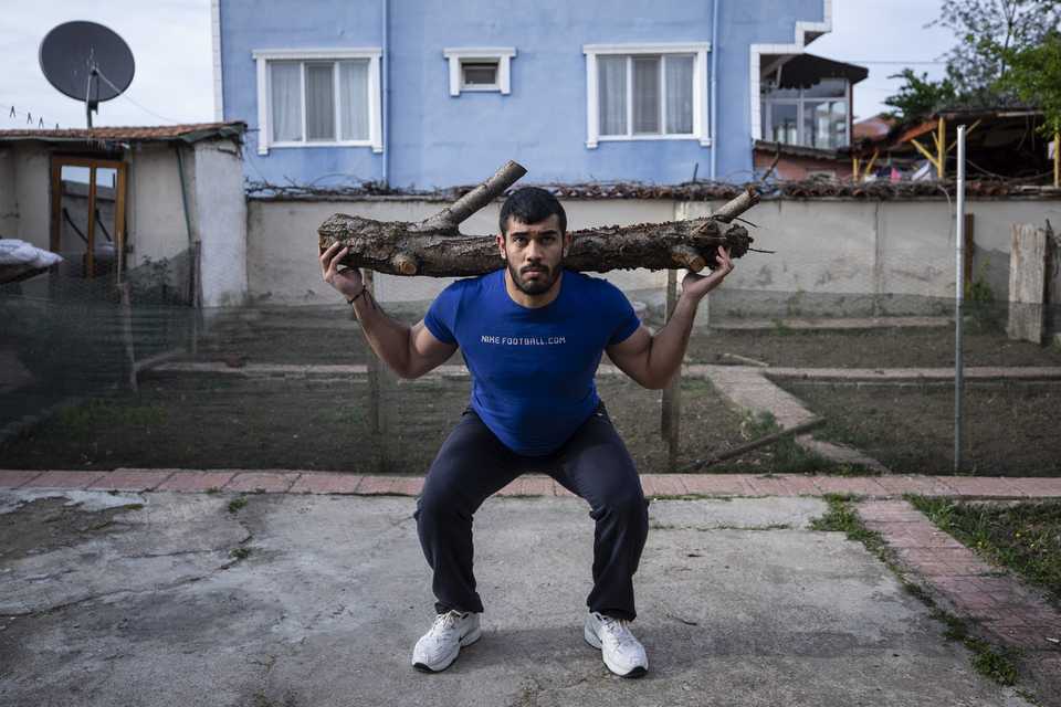 Wrestler Cetin Bekes is seen training at the yard of his house on April 25, 2020 in Edirne, Turkey.