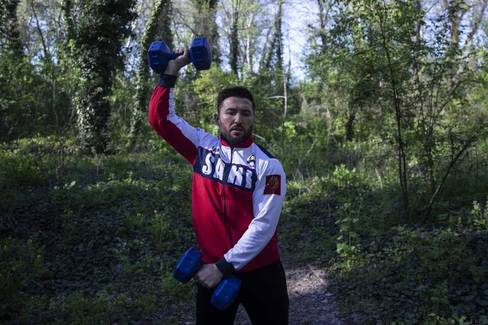 Wrestler Huseyin Par is seen training at a forest in Edirne, Turkey.