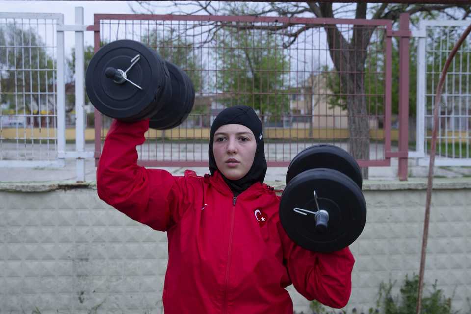 Wrestler Elif trains at a land near her house in Edirne, Turkey. Many wrestlers are training at home after the facilities closed in Edirne as part of the precautions taken against Covid-19 pandemic.