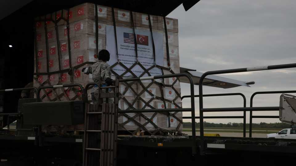 In this photograph, military personnel is seen loading the Covid-19 aid packages sent to the US from Ankara on April 28, 2020.