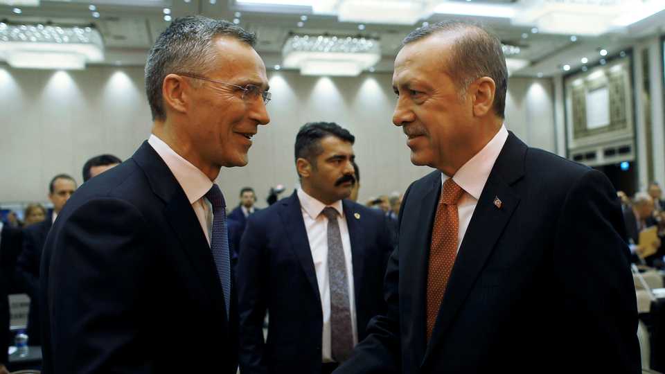 NATO Secretary General Jens Stoltenberg shakes hands with Turkish President Recep Tayyip Erdogan during the NATO Parliamentary Assembly 62nd Annual Session in Istanbul, Turkey, November 21, 2016.