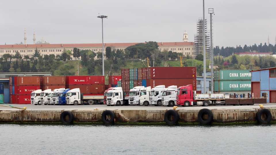 Trucks and shipping containers are pictured at Haydarpasa port in Istanbul, Turkey, April 18, 2018.