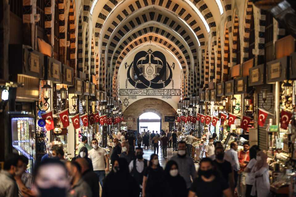 People with face masks in the Egyptian market during the first weekend without a coronavirus curfew imposed since April 10 in Istanbul, Turkey on June 6, 2020.