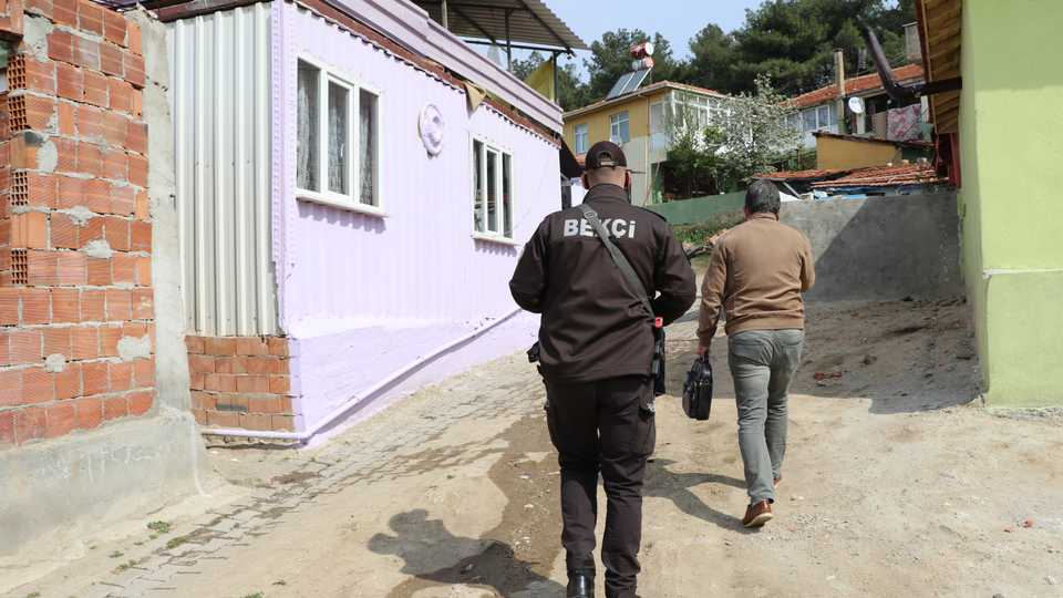 A “beckci” or neighbourhood watchman distributes cash support in Edirne as part of Turkey's social support programme initiated during the Covid-19 pandemic. April 20, 2020.
