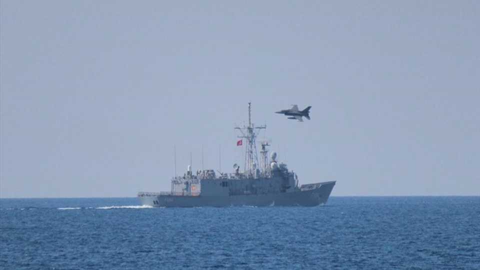 The picture from the Turkish military shows a Turkish frigate and a fighter jet as part of a drill conducted in Mediterranean sea on June 13, 2020.