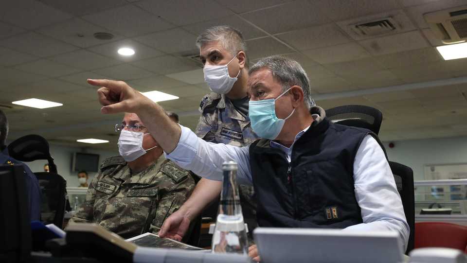 Minister of National Defence of Turkey, Hulusi Akar (R) follows the Operation Claw-Eagle launched against terrorists in northern Iraq at Air Force Command Control Center in Ankara, Turkey on June 15, 2020.