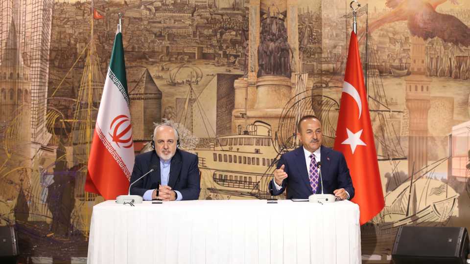 Turkish FM Mevlut Cavusoglu holds a news conference with his Iranian counterpart Javad Zarif in Istanbul, Turkey, June 15, 2020.
