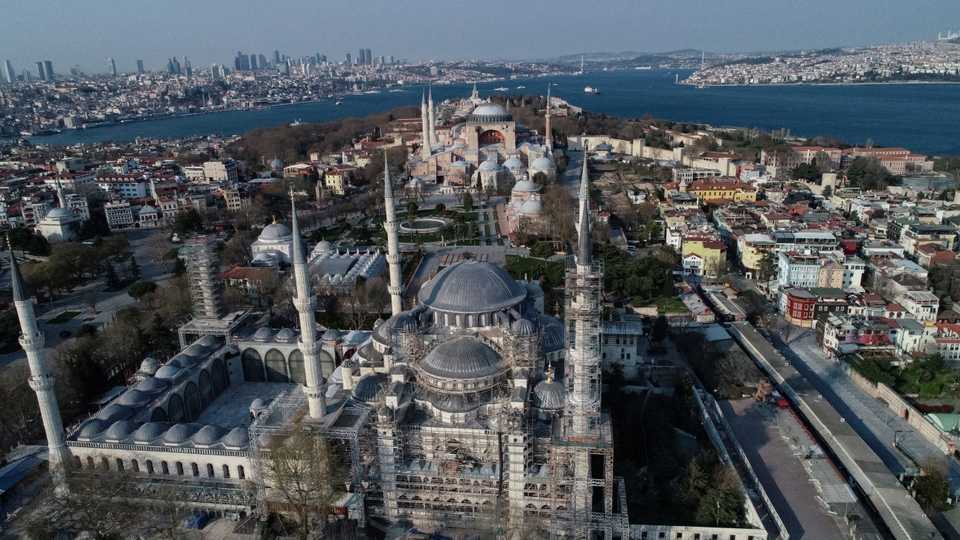 An aerial view shows deserted streets around Byzantine-era monument Hagia Sophia or Ayasofya, and the Ottoman-era Sultanahmet mosque, also known as the Blue Mosque in Istanbul, Turkey, April 11, 2020.