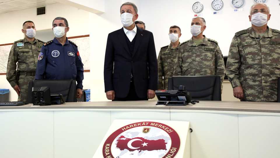 Defence Minister Hulusi Akar (C) and the Turkish Armed Forces Command managing Operation Claw-Tiger from Ankara, Turkey on June 18, 2020.