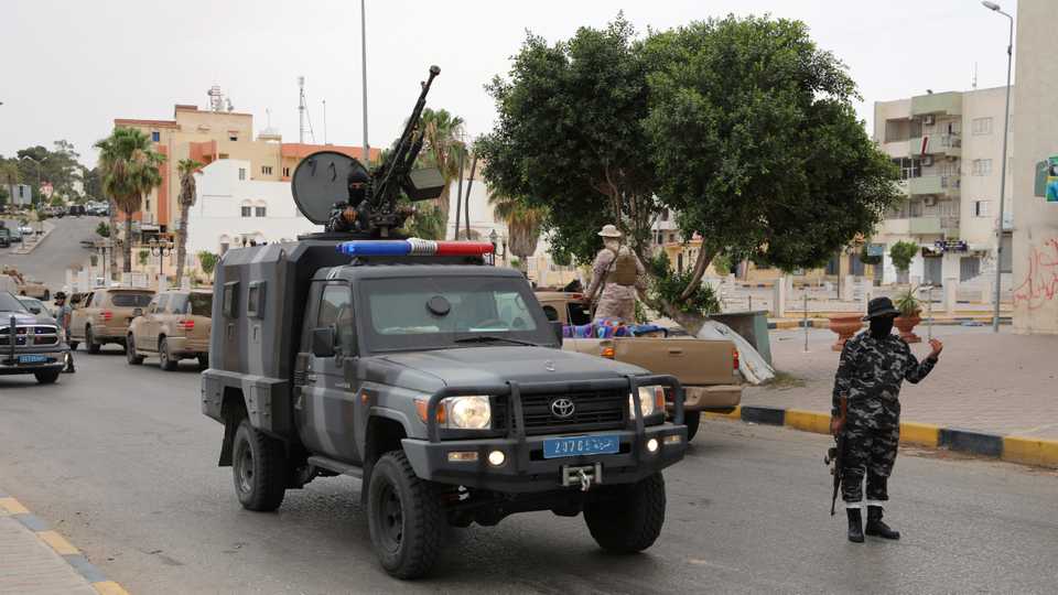 A member of security forces of Libya's internationally recognised government is seen during a security deployment in Tarhuna city, Libya, June 11, 2020.